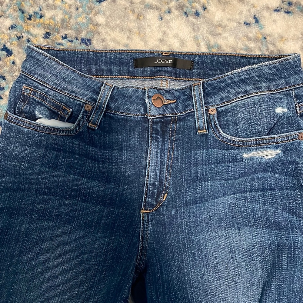 Joes blue jeans with rips on knees